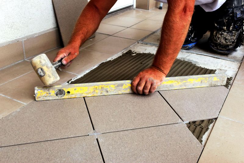 Professional Tile Installer at Work